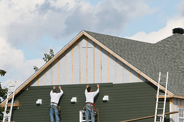 Professional Emergency Siding Repair technician working in Adamsville, TN